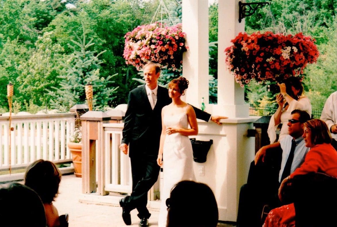 The clients' treasured wedding-day snapshot used as inspiration for the commissioned art